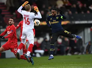 Arsenal's Lacazette Faces Off Against Standard Liege's Bodart in Europa League Clash