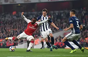 Arsenal V West Bromwich Albion 2017-18 Prints: Arsenal's Lacazette Faces Off Against West Brom's Krychowiak in Premier League Showdown