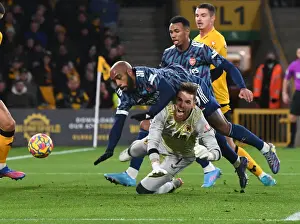 Arsenal's Lacazette Faces Off Against Wolverhampton's Sa in Premier League Clash