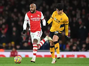Arsenal's Lacazette Goes Head-to-Head with Wolverhampton's Hwang Hee-Chan: Premier League Clash (2021-22)