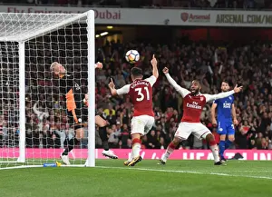 Arsenal V Leicester City 2017-18 Prints: Arsenal's Lacazette and Kolasinac Celebrate Goal Against Leicester's Schmeichel (2017-18)
