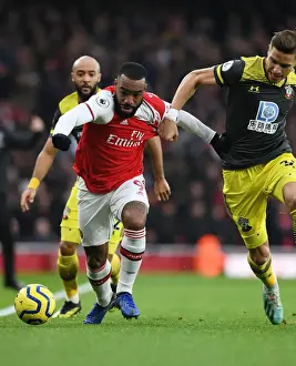 Arsenal's Lacazette Outwits Southampton's Bednarek: A Premier League Tactical Battle at Emirates Stadium
