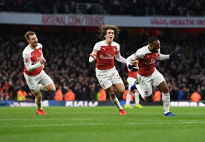 Images Dated 2nd December 2018: Arsenal's Lacazette, Ramsey, and Guendouzi Celebrate Goals Against Tottenham in 2018-19 Premier