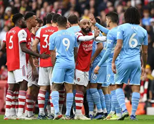 Arsenal's Lacazette Tries to Rally Team Against Manchester City in Premier League Clash