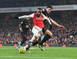 Arsenal's Lacazette vs. Maguire: A Premier League Rivalry Ignites - Arsenal vs. Manchester United