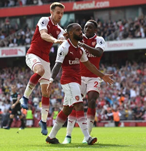 Arsenal v West Ham United 2017-18 Collection: Arsenal's Lacazette, Welbeck, and Ramsey Celebrate Goals Against West Ham