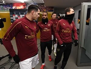 Images Dated 14th February 2019: Arsenal's Lacazette and Xhaka Deep in Conversation Before BATE Clash