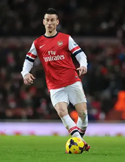 Arsenal V Cardiff City 2013-14 Prints: Arsenal's Laurent Koscielny in Action Against Cardiff City (2013-14)