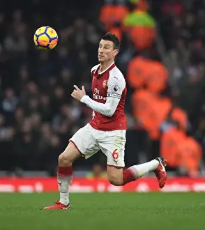Arsenal V Tottenham Hotspur 2017-18 Prints: Arsenal's Laurent Koscielny in Action Against Tottenham Hotspur