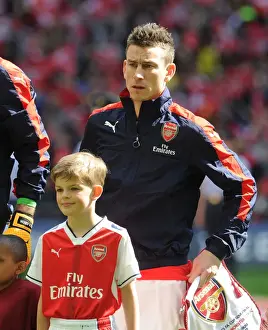 Arsenal's Laurent Koscielny and the Arsenal Mascot Ahead of FA Cup Semi-Final vs. Manchester City