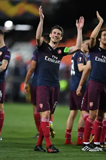 Arsenal's Laurent Koscielny Celebrates with Fans after UEFA Europa League Semi-Final Second Leg against Valencia