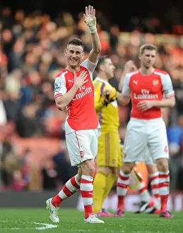 Arsenal's Laurent Koscielny Celebrates Goal Against West Ham United in Premier League Match, 2015