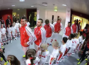 Pre Season Prints: Arsenal's Laurent Koscielny Before Emirates Cup Match vs AS Monaco, 2014