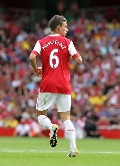 Arsenal V AC Milan 2010-11 Prints: Arsenal's Laurent Koscielny Faces Off Against AC Milan at the Emirates Cup, 2010