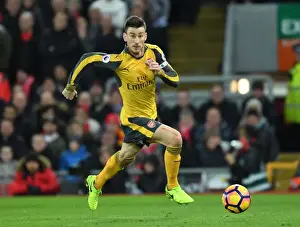 Liverpool V Arsenal 2016-17 Prints: Arsenal's Laurent Koscielny Faces Off Against Liverpool at Anfield (Premier League 2016-17)