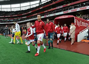 Arsenal V Tottenham Hotspur 2017-18 Prints: Arsenal's Laurent Koscielny Leads Team Out Against Tottenham in Premier League Clash