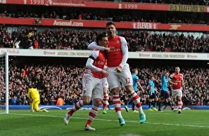 Images Dated 11th January 2015: Arsenal's Laurent Koscielny and Olivier Giroud Celebrate Goal Against Stoke City (2014-15)