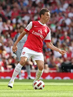 Arsenal V AC Milan 2010-11 Prints: Arsenal's Laurent Koscielny in a Tie-Breaker Against AC Milan at the Emirates Cup