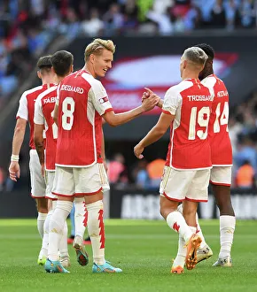 Arsenal's Leandro Trossard and Martin Odegaard Celebrate Goal: Arsenal vs Manchester City - FA Community Shield 2023-24