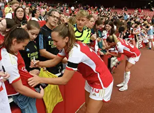 Arsenal's Lia Walti Greets Fans with Autographs After Arsenal Women's Victory Over Liverpool