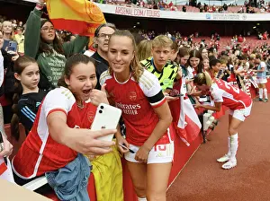Arsenal Women V Liverpool Women 2023-24 Prints: Arsenal's Lia Walti and Young Fan: A Selfie Moment after Arsenal Women vs Liverpool Women (2023-24)