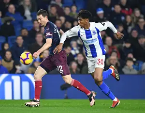 Brighton And Hove Albion V Arsenal 2018-19 Prints: Arsenal's Lichtsteiner Battles Past Brighton's Bernardo in Premier League Clash