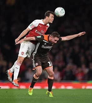 Images Dated 26th September 2018: Arsenal's Lichtsteiner Fends Off Judge in Carabao Cup Clash