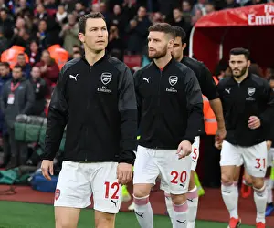 Arsenal V Huddersfield Town - 2018-19 Prints: Arsenal's Lichtsteiner and Mustafi in Action against Huddersfield Town