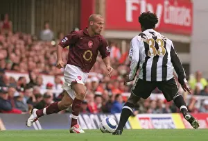 Arsenal's Ljungberg and Babayaro Clash in FA Premier League Showdown: Arsenal 2-0 Newcastle United at Highbury, 2005