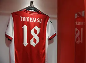 Arsenal's Empty Locker Room: Tomiyasu's Absence in Carabao Cup Semi-Final vs. Liverpool