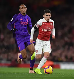 Arsenal V Liverpool 2018-19 Prints: Arsenal's Lucas Torreira Clashes with Liverpool's Fabinho in Premier League Showdown