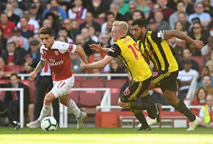 Images Dated 29th September 2018: Arsenal's Lucas Torreira Faces Off Against Watford's Will Hughes and Troy Deeney