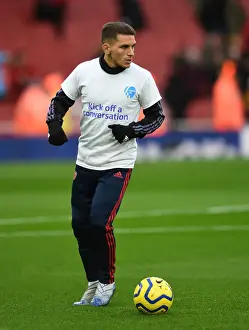 Arsenal V Newcastle United 2019-20 Prints: Arsenal's Lucas Torreira Wears Heads Up Shirt During Warm-Up vs Newcastle United (Arsenal v Newcastle)