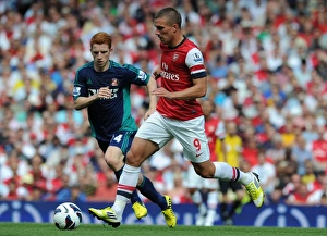 Arsenal's Lukas Podolski in Action: Arsenal vs. Sunderland (2012-13 Premier League)