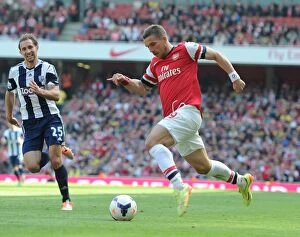 Images Dated 4th May 2014: Arsenal's Lukas Podolski in Action Against West Bromwich Albion, Premier League 2013-14