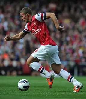 Arsenal V Chelsea 2012-13 Prints: Arsenal's Lukas Podolski Faces Off Against Chelsea in the Premier League