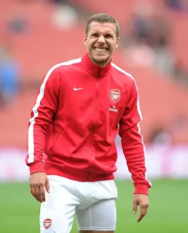 Arsenal V Aston Villa 2013-14 Prints: Arsenal's Lukas Podolski Readies for Arsenal v Aston Villa Clash (2013-14 Premier League)