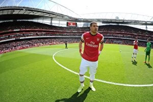 Images Dated 4th May 2014: Arsenal's Lukas Podolski Readies for Arsenal v West Bromwich Albion in Premier League (2013-14)