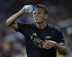 Arsenal's Martin Odegaard in Action: Pre-Season Clash with Orlando City SC (2022-23)