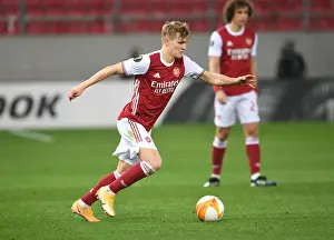 Arsenal's Martin Odegaard in Action against SL Benfica in the Europa League Round of 32, Piraeus, Greece (February 2021)