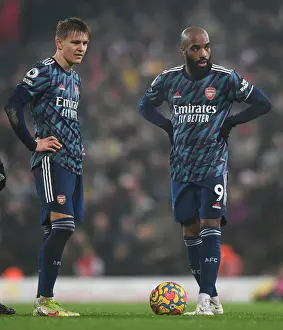 Arsenal's Martin Odegaard and Alexandre Lacazette in Action against Norwich City, Premier League 2021-22