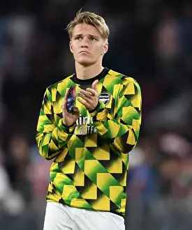 Arsenal's Martin Odegaard Celebrates with Fans after Europa League Victory over PSV Eindhoven