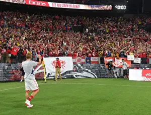 Arsenal's Martin Odegaard Celebrates with Fans after Pre-Season Victory over Everton