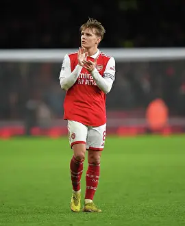 Arsenal's Martin Odegaard Celebrates with Fans after Victory over Newcastle United