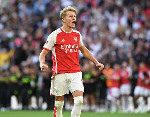 Arsenal's Martin Odegaard Celebrates Penalty Goal in FA Community Shield Showdown vs Manchester City (2023-24)