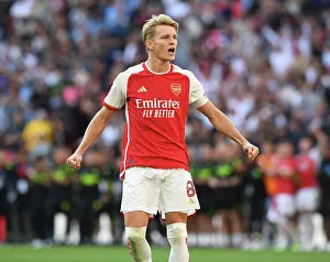 Arsenal's Martin Odegaard Celebrates Penalty Win in FA Community Shield Thriller: Arsenal vs Manchester City (2023-24)