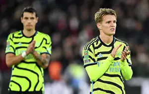 West Ham United V Arsenal - Carabao Cup 2023-24 Prints: Arsenal's Martin Odegaard Celebrates after West Ham Cup Upset