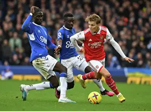 Everton V Arsenal 2022-23 Prints: Arsenal's Martin Odegaard Clashes with Everton's Amadou Onana in Premier League Showdown