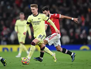 Manchester United V Arsenal 2020-21 Prints: Arsenal's Martin Odegaard Clashes with Manchester United at Old Trafford (Premier League 2020-21)