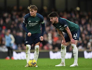 Fulham v Arsenal 2023-24 Collection: Arsenal's Martin Odegaard and Declan Rice Clash in Premier League Showdown